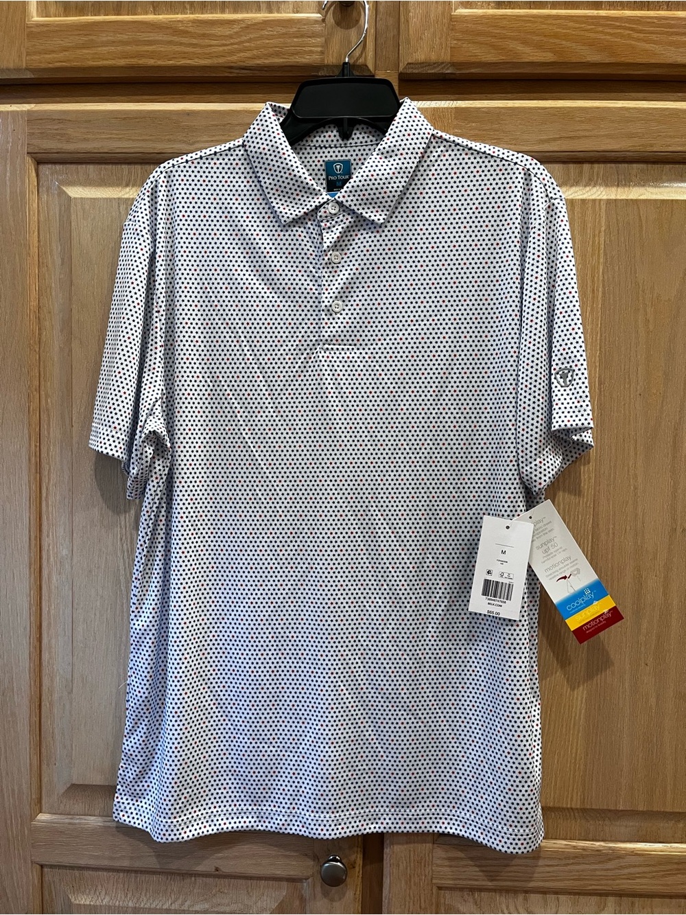 Pro Tour Men’s White Polo with Navy and Red Star Pattern